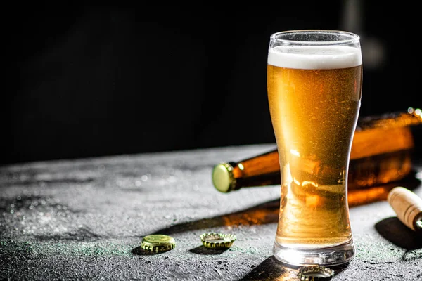 stock image Glass with beer . On rustic background.