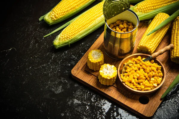 Canned corn on a board.