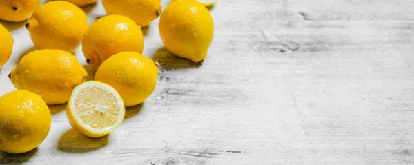Fresh lemons. On a light table.
