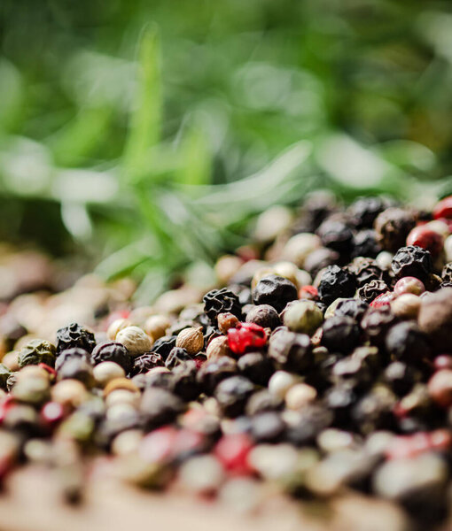 Peppercorn on a rustic background.