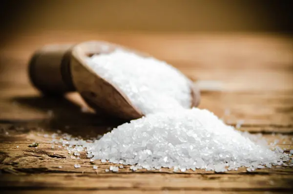 stock image Salt background . On a wooden table.