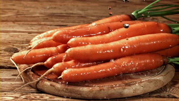Капли Воды Падают Морковь Снято Высокоскоростную Камеру Скоростью 1000 Кадров — стоковое видео