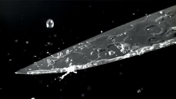 ナイフの刃に水が落ちる 1000Fpsで高速カメラで撮影しました 高品質のフルHd映像 — ストック動画