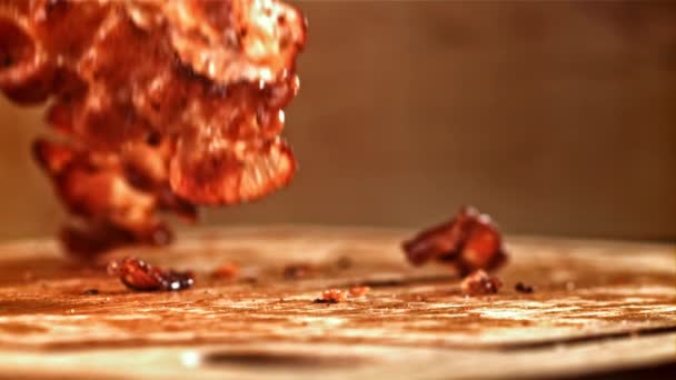 Roasted Slices Bacon Fall Wooden Table Filmed High Speed Camera — Stock Video
