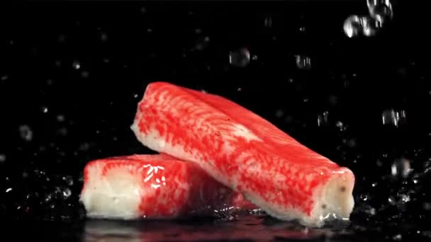Drops Water Fall Fresh Crab Sticks Filmed High Speed Camera — Stock Video