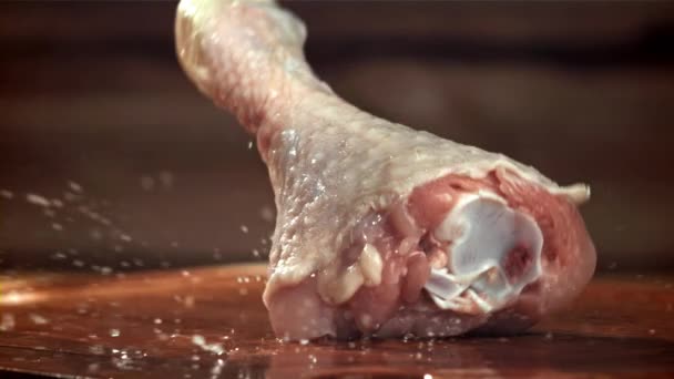 Chicken Legs Fall Wooden Cutting Board Filmed High Speed Camera — Stock Video