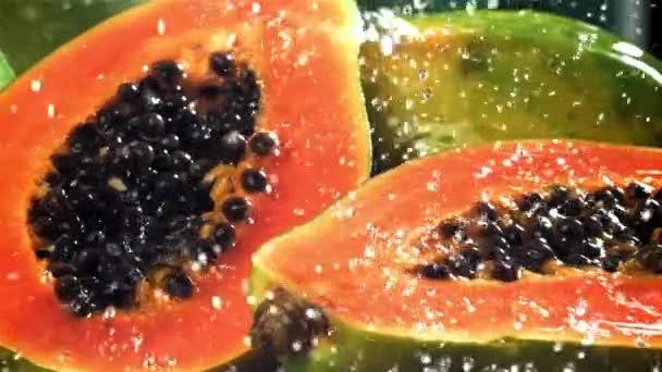 Fresh Tropical Papaya Drops Splashes Water Filmed High Speed Camera — Stock Video