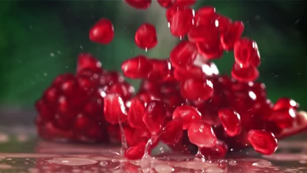 Pomegranate Seeds Fall Table Splashes Filmed High Speed Camera 1000 — Stock Video