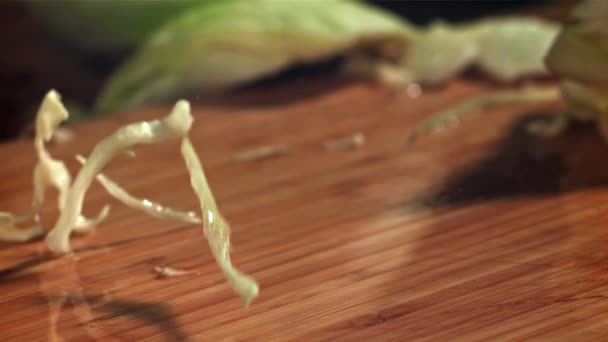 Shredded Cabbage Falls Cutting Board Filmed High Speed Camera 1000 — Stock Video