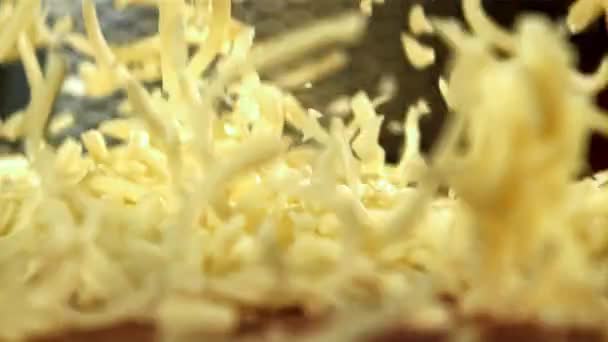 Grated Cheese Falls Wooden Board Filmed High Speed Camera 1000 — Stock Video
