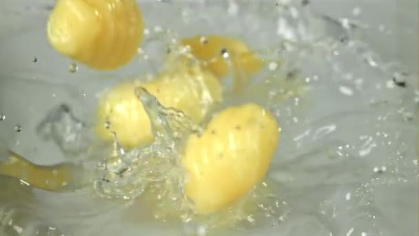 Italian Gnocchi Fall Water Splashes Filmed High Speed Camera 1000 — Stock Video