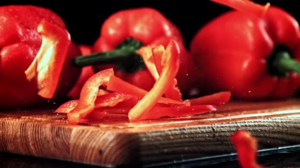 Super Slow Motion Chopped Sweet Peppers Fall Cutting Board High — Stock Video