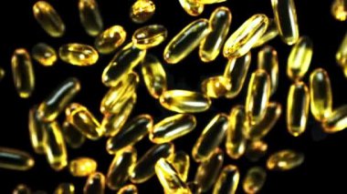 Süper yavaş çekimde Omega 3 vitamin kapsülleri yükselir ve düşer. Yüksek kaliteli FullHD görüntüler