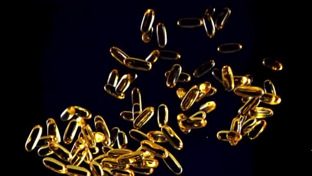 Süper Yavaş Çekimde Omega Vitamin Kapsülleri Yükselir Düşer Yüksek Kaliteli — Stok video