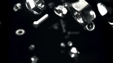Çeşitli fındık, cıvata ve çamaşır makineleri. 1000 fps 'de yüksek hızlı bir kamerayla çekildi. Yüksek kaliteli FullHD görüntüler