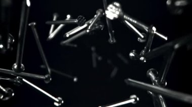 Çiviler düşüyor. 1000 fps 'de yüksek hızlı bir kamerayla çekildi. Yüksek kaliteli FullHD görüntüler