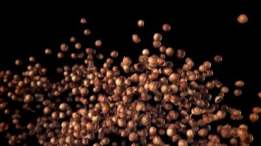 Kişniş taneleri uçar ve düşer. 1000 fps 'de yüksek hızlı bir kamerayla çekildi. Yüksek kaliteli FullHD görüntüler