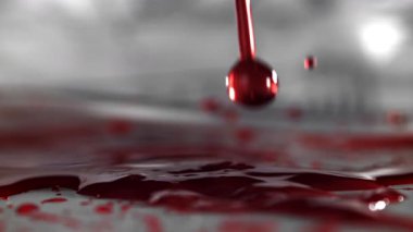Kan damlaları masaya düşer. 1000 fps 'de yüksek hızlı bir kamerayla çekildi. Yüksek kaliteli FullHD görüntüler