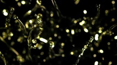 Bir damla zeytinyağı damlatıyor. 1000 fps 'de yüksek hızlı bir kamerayla çekildi. Yüksek kaliteli FullHD görüntüler