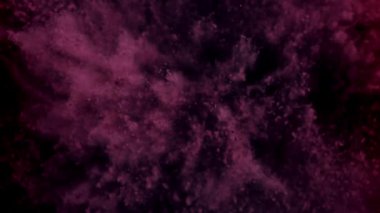 Holi festivali. Renkli tozlar uçar ve düşer. 1000 fps 'de yüksek hızlı bir kamerayla çekildi. Yüksek kaliteli FullHD görüntüler