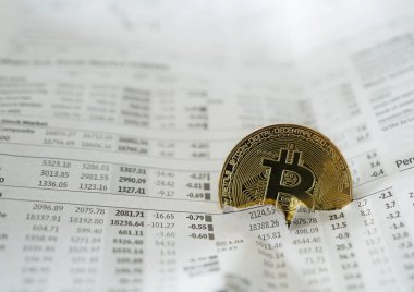 Bitcoin yırtılan gazete hisse senedi fiyatlarına çarpıyor
