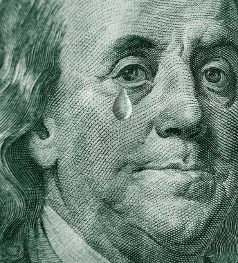 Closeup of Ben Franklin on a hundred dollar bill crying with a tear on his cheek                              clipart