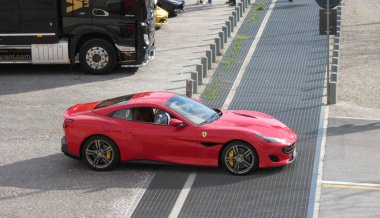 URBINO, ITALY - CIRCA APRIL 2022: red Ferrari Portofino at a sport cars exhibition