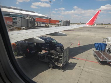 COPENHAGEN, DENMARK - CIRCA JULY 2019: replacing aircraft wheels