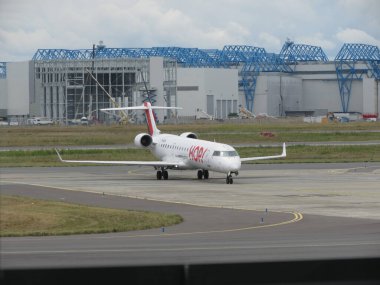 TOULOUSE, FRANCE - CIRCA AUGUST 2018: Hop! for AirFrance Bombardier CRJ-700 during taxi clipart