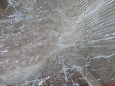 broken glass surface useful as social issue concept