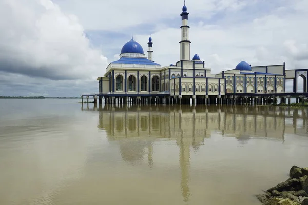 stock image Perak, Malaysia-November 12, 2022; a floating mosque against cloudy sky  located at Bagan Datuk, Perak