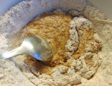 adding ingredients for making cocoa flavoured dough