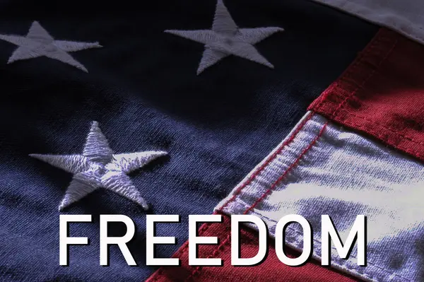 Frihet Ordet Över Närbild Amerikansk Flagga Stockfoto