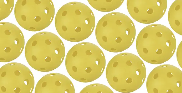 白色背景上的许多黄色泡菜球 免版税图库图片