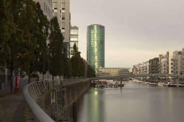 The Westhafen Tower in Frankfurt in the evening light clipart