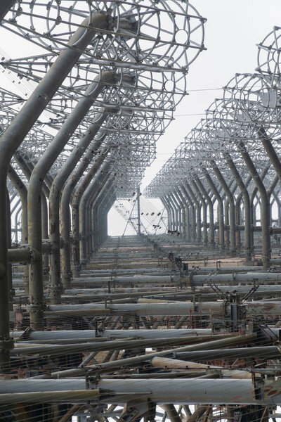 old OTH radar missile system defense geometric pattern structure viewed from below at chernobyl exclusion zone