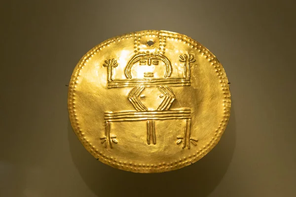 stock image ancient indigenous rounded chaman-frog golden pectoral at colombian golden museum