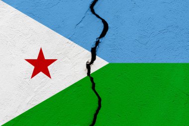 Cibuti Cumhuriyeti bayrağı bir grunge çatlağı duvarına saplandı. Jeopolitik ve doğal afet kavramı