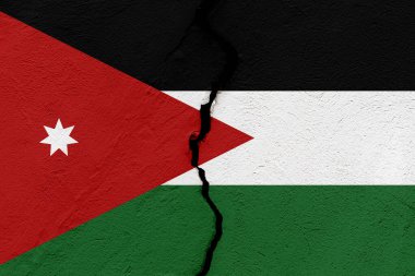 Ürdün Haşhaş Krallığı 'nın bayrağı, bir grunge çatlağı duvarına saplandı. Jeopolitik ve doğal afet kavramı