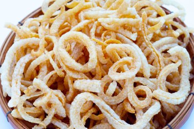 Crispy pork rinds or pork snack.