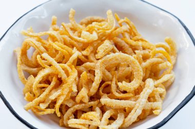 Crispy pork rinds or pork snack.