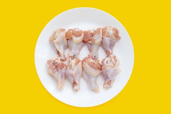 Fresh Raw Chicken Wings Wingstick White Plate Yellow Background — Stock Photo, Image