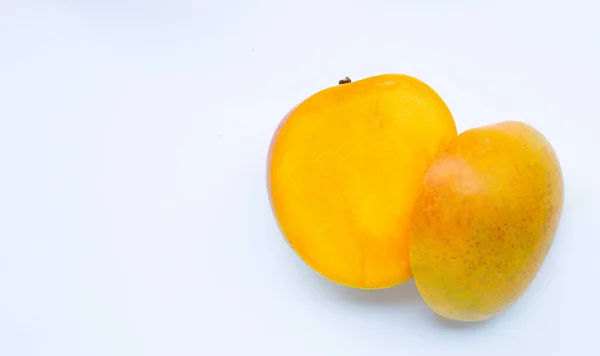 stock image Tropical fruit, Mango on white background. Top view