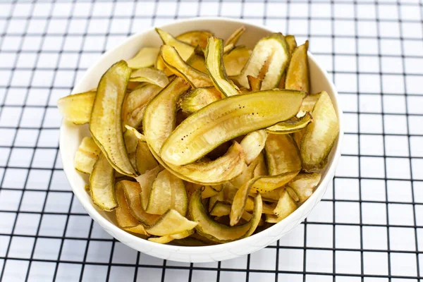 stock image Green banana chips with peel