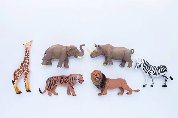Plástico Brinquedos Animais Selva Fundo Branco — Fotografia de Stock