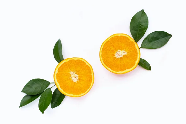 stock image Orange fruit with green leaves on white background.