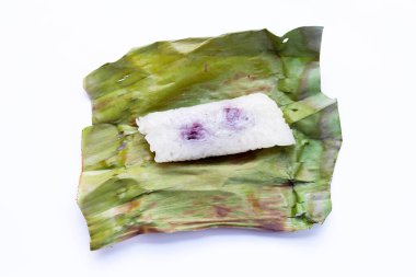 Grilled sticky rice in banana leaves with taro filling