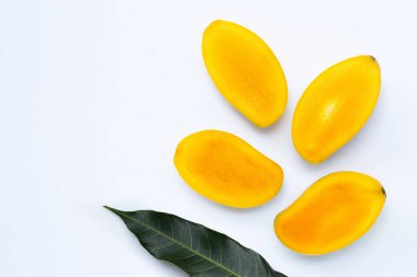 Fresh sliced Mango on white background. Copy space
