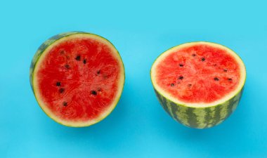 Sweet watermelon on blue background.