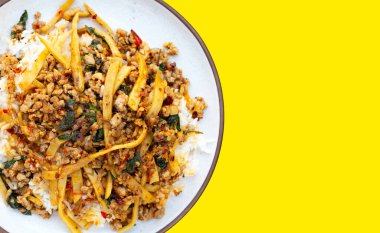 Rice with spicy stir fried pork with holy basil and preserved bamboo shoot